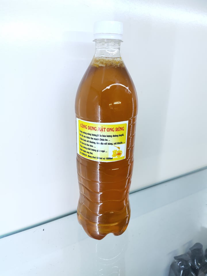 Mật ong rừng nguyên chất chai 1 lít (tuyển sỉ đại lý 0934449922)